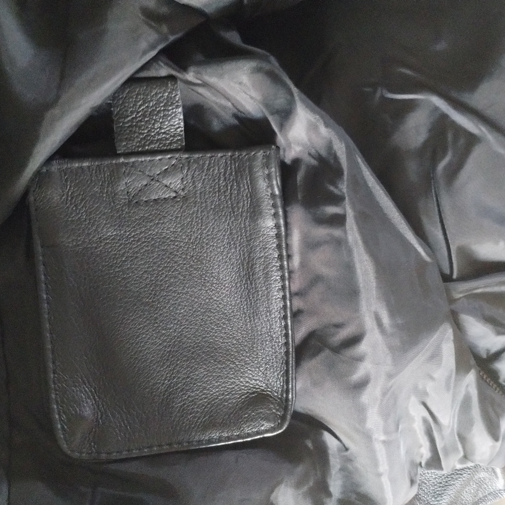 Biker leather coat. Removable lining inside cell phone holder